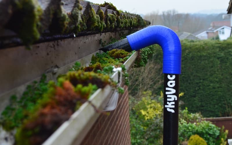 SkyVac gutter cleaning in action